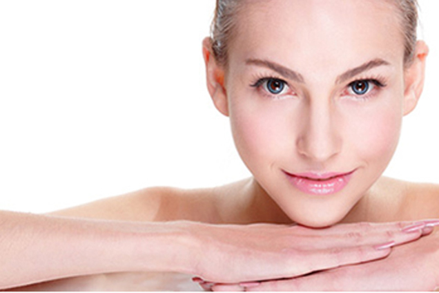 Woman looking straight forwar with arms folded